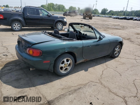 2000 Mazda MX-5 Miata with VIN JM1NB3533Y0151883, listed as a Copart auction lot 64423925 with 180,275 mi miles and Salvage title. Bid and sale history available at DreamBid. Image 3.