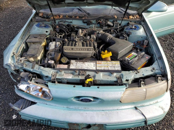 1994 Ford Taurus with VIN 1FALP5747RG236623, listed as a Copart auction lot 85242504 with 205,550 mi miles and Salvage title. Bid and sale history available at DreamBid. Image 11.