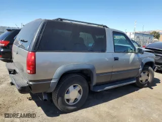 1999 Chevrolet Tahoe with VIN 3GNEK18R5XG184695, listed as a Copart auction lot 67697224 with 135,316 mi miles and Salvage Title. Bid and sale history available at carsss.com. Image 3.
