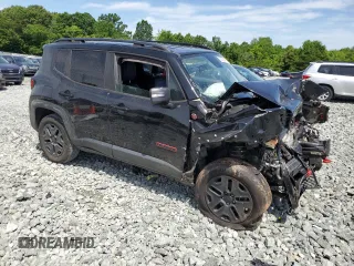2018 Jeep Renegade Trailhawk with VIN ZACCJBCB0JPH15701, listed as a Copart auction lot 57450485 with Not provided miles and Salvage title. Bid and sale history available at DreamBid. Image 4.