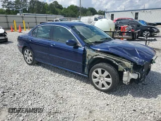 2004 Jaguar X-Type with VIN SAJEA51C44WD83361, listed as a Copart auction lot 55643545 with 54,615 mi miles and Salvage Title. Bid and sale history available at DreamBid. Image 4.