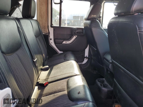 2013 Jeep Wrangler Unlimited Sport z VIN 1C4HJWDG9DL581643, wystawiony jako Copart lot #60775805 z przebiegiem 148 959 mil mil oraz Czysty tytuł • Clean title. Historia ofert i sprzedaży dostępna na DreamBid. Obrazek 11.
