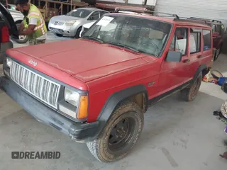 1996 Jeep Cherokee Sport with VIN 1J4FJ68S0TL177046, listed as a IAAI auction lot 42412615 with 176,657 mi miles and . Bid and sale history available at DreamBid. Image 2.