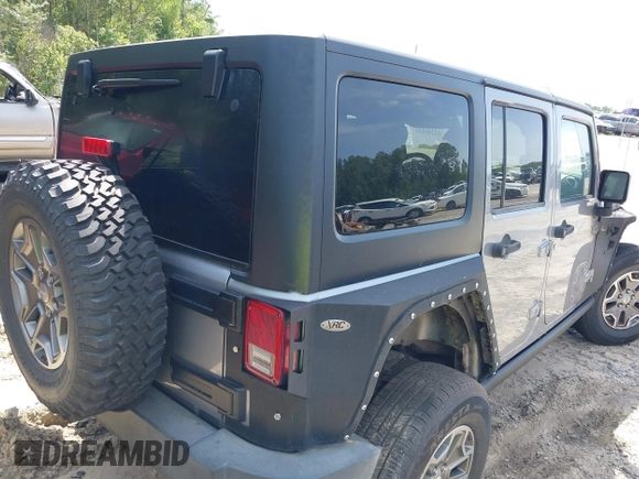 2016 Jeep Wrangler Unlimited Rubicon Hard Rock with VIN 1C4BJWFG6GL265320, listed as a IAAI auction lot 42260151 with Not provided miles and . Bid and sale history available at DreamBid. Image 4.