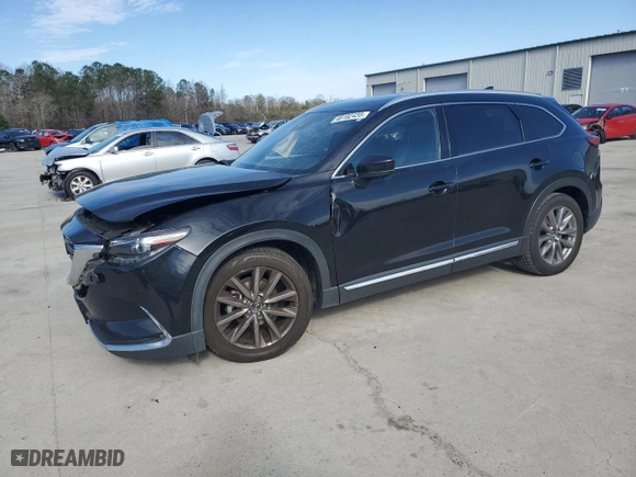 2021 Mazda CX-9 Grand Touring with VIN JM3TCBDY9M0512353, listed as a Copart auction lot 48182435 with 83,242 mi miles and Salvage Title. Bid and sale history available at carsss.com. Image 1.
