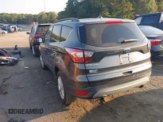 2018 Ford Escape SEL with VIN 1FMCU9HD0JUC25036, listed as a IAAI auction lot 40518589 with 143,076 mi miles. Bid and sale history available at carsss.com. Image 3.