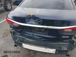 2017 Mazda 6 Sport with VIN JM1GL1U51H1156104, listed as a IAAI auction lot 41769388 with 121,405 mi miles and . Bid and sale history available at DreamBid. Image 6.