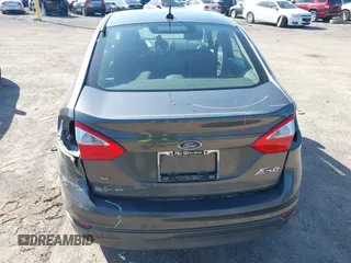 2017 Ford Fiesta SE with VIN 3FADP4BJ0HM117117, listed as a IAAI auction lot 41983052 with 99,186 mi miles. Bid and sale history available at carsss.com. Image 13.