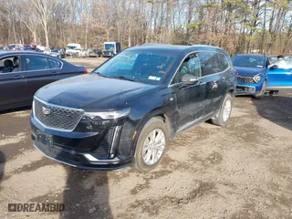 2023 Cadillac XT6 Luxury with VIN 1GYKPBR41PZ136918, listed as a IAAI auction lot 41417724 with 57,949 mi miles. Bid and sale history available at carsss.com. Image 17.