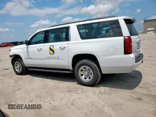 2019 Chevrolet Suburban with VIN 1GNSCKEC9KR230768, listed as a Copart auction lot 58822915 with 96,823 mi miles and Salvage title. Bid and sale history available at DreamBid. Image 2.