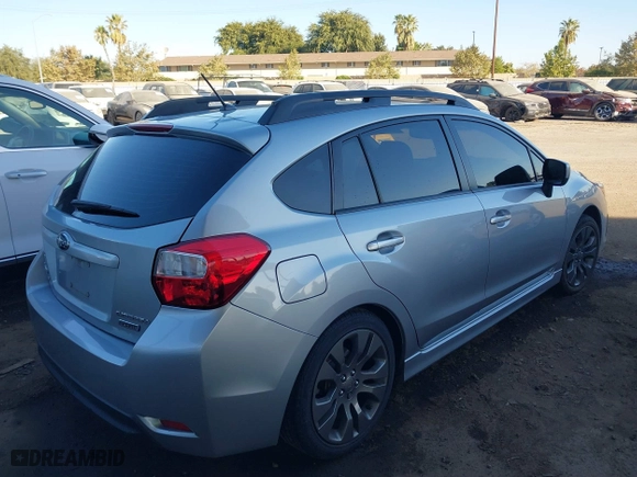 2013 Subaru Impreza Wagon 2.0i Sport Premium with VIN JF1GPAL61DH204707, listed as a IAAI auction lot 40641252 with 142,653 mi miles. Bid and sale history available at carsss.com. Image 4.