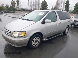 2001 Toyota Sienna LE with VIN 4T3ZF13CX1U400520, listed as a IAAI auction lot 41725348 with 258,267 mi miles. Bid and sale history available at carsss.com. Image 2.