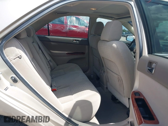 2006 Toyota Camry STD z VIN 4T1BE30KX6U658158, wystawiony jako IAAI lot #42394262 z przebiegiem 102 830 mil mil oraz . Historia ofert i sprzedaży dostępna na DreamBid. Obrazek 8.