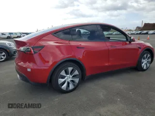 2021 Tesla Model Y Standard Range z VIN 5YJYGDED7MF111377, wystawiony jako Copart lot #45772075 z przebiegiem 34 331 mil mil oraz Szkoda całkowita • Salvage title. Historia ofert i sprzedaży dostępna na DreamBid. Obrazek 3.