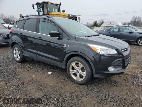2014 Ford Escape SE with VIN 1FMCU9GX2EUA26491, listed as a Copart auction lot 43094275 with 129,174 mi miles and Clean Title. Bid and sale history available at DreamBid. Image 4.