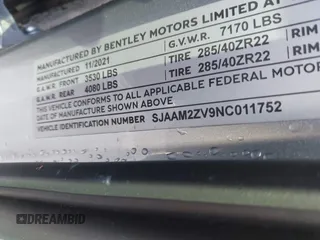 2022 Bentley Bentayga V8 z VIN SJAAM2ZV9NC011752, wystawiony jako IAAI lot #41265000 z przebiegiem Nie podano mil oraz . Historia ofert i sprzedaży dostępna na DreamBid. Obrazek 9.