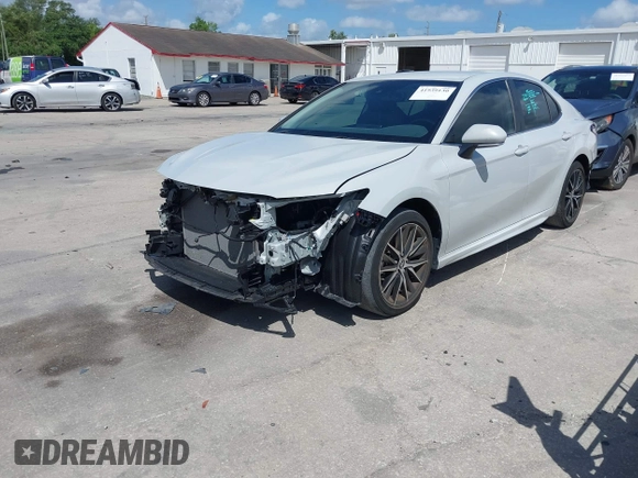 2023 Toyota Camry SE with VIN 4T1T11AK6PU172984, listed as a IAAI auction lot 41939130 with 55,169 mi miles and . Bid and sale history available at DreamBid. Image 2.