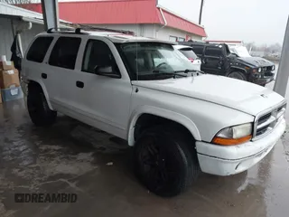 2002 Dodge Durango SLT z VIN 1B4HS48N92F219105, wystawiony jako IAAI lot #41465493 z przebiegiem 182 189 mil mil oraz . Historia ofert i sprzedaży dostępna na DreamBid. Obrazek 1.