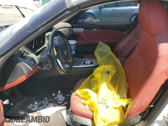 2011 BMW Z4 sDrive30i с VIN WBALM5C53BE380136, выставлен на аукционе Copart как лот 51761605 с пробегом 145 367 миль миль и Списание • Salvage title. История ставок и продаж доступна на DreamBid. Изображение 7.