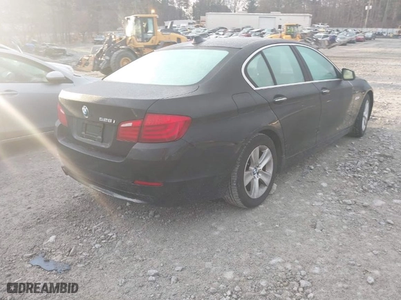 2012 BMW 5 Series 528i with VIN WBAXG5C52CDX05794, listed as a IAAI auction lot 41796084 with 104,022 mi miles. Bid and sale history available at carsss.com. Image 4.