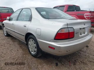1997 Honda Accord LX with VIN JHMCD5638VC000719, listed as a IAAI auction lot 42190141 with 325,010 mi miles and . Bid and sale history available at carsss.com. Image 3.