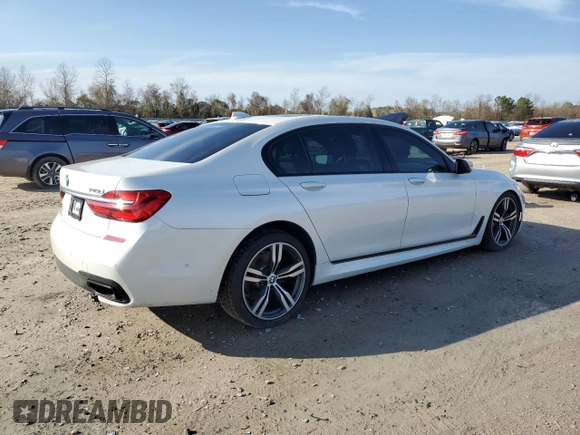 2016 BMW 7 Series 740i with VIN WBA7E2C58GG548314, listed as a Copart auction lot 72876922 with 74,981 mi miles. Bid and sale history available at carsss.com. Image 3.
