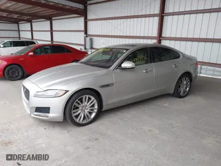 2016 Jaguar XF 35t Prestige with VIN SAJBE4BV2GCY16583, listed as a IAAI auction lot 41997274 with 81,186 mi miles. Bid and sale history available at carsss.com. Image 2.