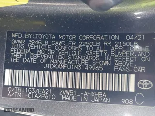 2021 Toyota Prius L Eco with VIN JTDKAMFU1M3149965, listed as a IAAI auction lot 38641916 with 69,942 mi miles. Bid and sale history available at carsss.com. Image 9.
