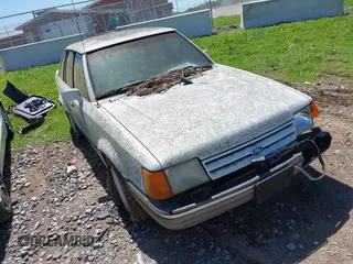 1989 Ford Escort z VIN 1FAPP9591KT185723, wystawiony jako IAAI lot #42257967 z przebiegiem 318 953 mil mil oraz . Historia ofert i sprzedaży dostępna na DreamBid. Obrazek 1.