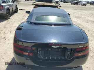 2009 Aston Martin DB9 z VIN SCFAD02E79GB10991, wystawiony jako Copart lot #75089204 z przebiegiem Nie podano mil oraz Szkody całkowita. Historia ofert i sprzedaży dostępna na DreamBid. Obrazek 6.