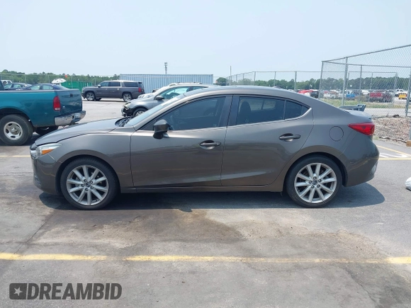 2017 Mazda 3 Touring with VIN 3MZBN1V74HM142735, listed as a IAAI auction lot 42395462 with 137,543 mi miles and . Bid and sale history available at DreamBid. Image 14.