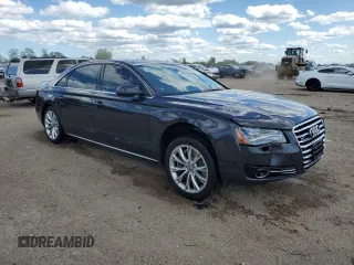 2012 Audi A8 z VIN WAURVAFD2CN021722, wystawiony jako Copart lot #58353745 z przebiegiem 117 302 mil mil oraz Szkoda całkowita • Salvage title. Historia ofert i sprzedaży dostępna na DreamBid. Obrazek 4.