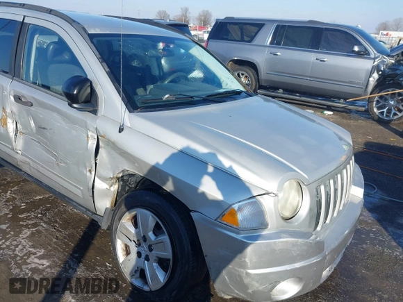 2008 Jeep Compass Sport with VIN 1J8FT47098D665734, listed as a IAAI auction lot 41561801 with 169,446 mi miles. Bid and sale history available at carsss.com. Image 6.