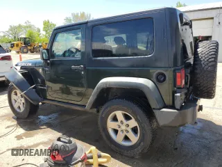 2010 Jeep Wrangler Rubicon with VIN 1J4BA6D12AL221220, listed as a Copart auction lot 56057055 with 200,346 mi miles and Salvage title. Bid and sale history available at DreamBid. Image 2.