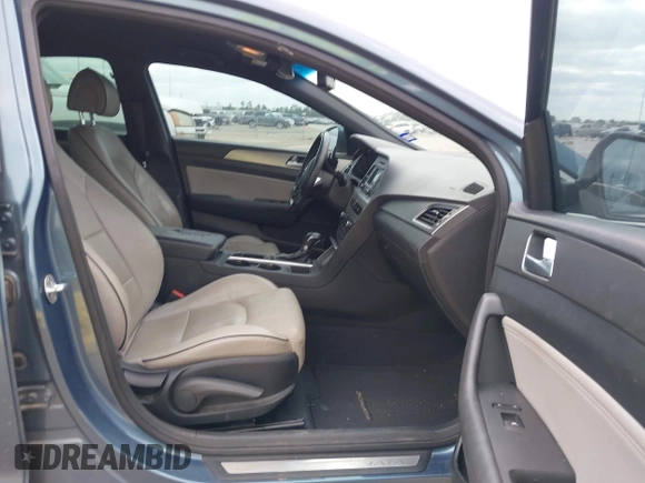 2015 Hyundai Sonata Sport with VIN 5NPE34AB5FH163825, listed as a IAAI auction lot 42013743 with Not Provided miles and . Bid and sale history available at carsss.com. Image 5.