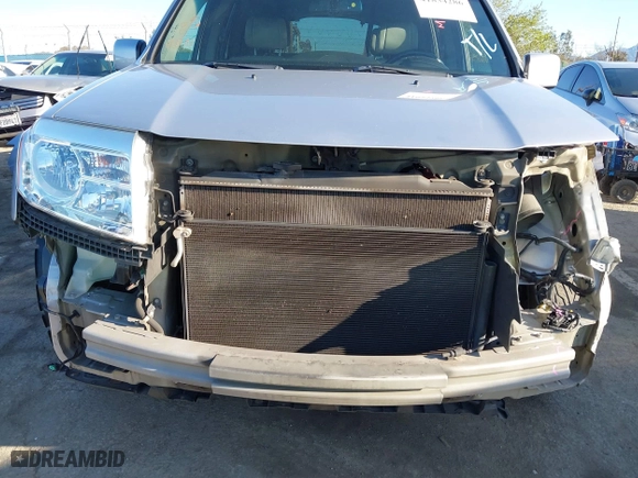 2012 Honda Pilot EX-L with VIN 5FNYF3H58CB038956, listed as a IAAI auction lot 41834286 with 176,093 mi miles. Bid and sale history available at carsss.com. Image 6.