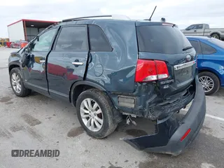 2011 Kia Sorento LX with VIN 5XYKTDA23BG068572, listed as a IAAI auction lot 41036588 with 215,145 mi miles. Bid and sale history available at carsss.com. Image 3.