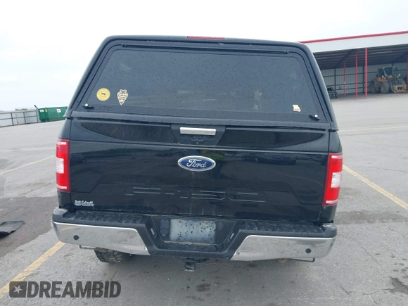 2018 Ford F-150 XL with VIN 1FTEW1E5XJKC37082, listed as a IAAI auction lot 42335721 with 167,401 mi miles and . Bid and sale history available at DreamBid. Image 15.