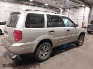 2005 Honda Pilot EX-L with VIN 2HKYF18575H557005, listed as a IAAI auction lot 41647830 with 245,992 mi miles. Bid and sale history available at carsss.com. Image 4.
