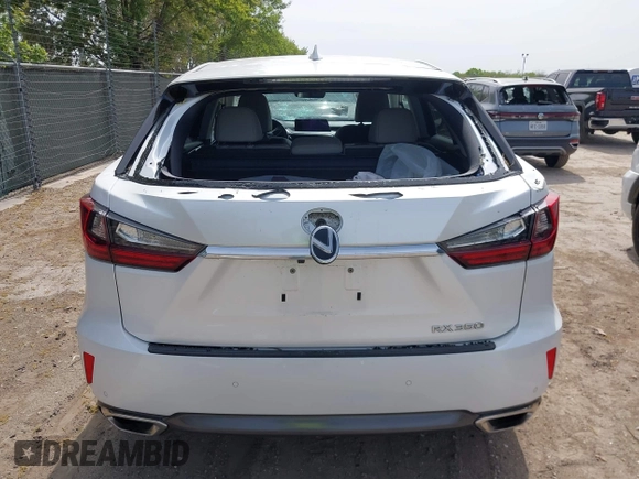 2019 Lexus RX 350 z VIN 2T2ZZMCA4KC126214, wystawiony jako IAAI lot #41881877 z przebiegiem 91 419 mil mil oraz . Historia ofert i sprzedaży dostępna na DreamBid. Obrazek 16.