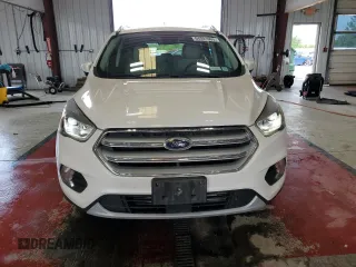 2018 Ford Escape Titanium с VIN 1FMCU9J90JUB30658, выставлен на аукционе Copart как лот 64001665 с пробегом 61 970 миль миль и Списание • Salvage title. История ставок и продаж доступна на DreamBid. Изображение 5.