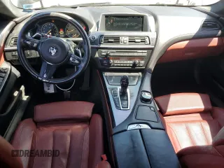 2015 BMW 6 Series 640i xDrive z VIN WBA6B8C53FD453909, wystawiony jako Copart lot #55292765 z przebiegiem 84 971 mil mil oraz Szkoda całkowita • Salvage title. Historia ofert i sprzedaży dostępna na DreamBid. Obrazek 8.