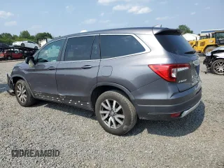 2019 Honda Pilot EX-L with VIN 5FNYF6H54KB052448, listed as a Copart auction lot 60498925 with 146,113 mi miles and Salvage title. Bid and sale history available at DreamBid. Image 2.