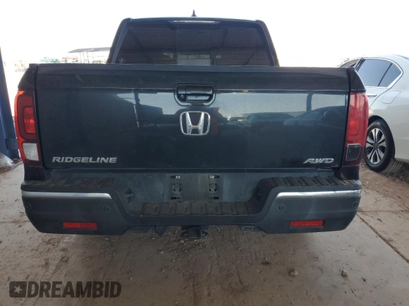 2020 Honda Ridgeline RTL-E with VIN 5FPYK3F75LB009423, listed as a Copart auction lot 54187325 with 96,128 mi miles and Salvage title. Bid and sale history available at DreamBid. Image 6.