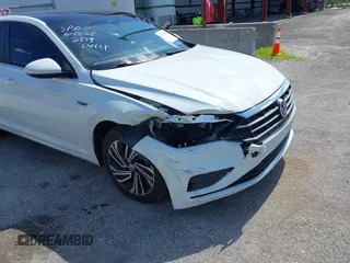 2021 Volkswagen Jetta SEL with VIN 3VWE57BU2MM047028, listed as a IAAI auction lot 42563875 with 56,695 mi miles and . Bid and sale history available at DreamBid. Image 6.