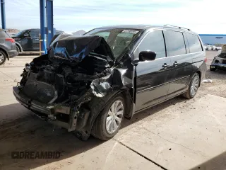 2009 Honda Odyssey Touring with VIN 5FNRL38889B030694, listed as a Copart auction lot 41790495 with 66,799 mi miles and Salvage Title. Bid and sale history available at carsss.com. Image 1.