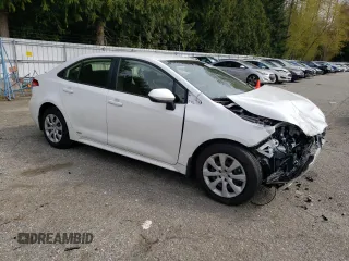 2023 Toyota Corolla Hybrid LE with VIN JTDBDMHE2PJ002549, listed as a Copart auction lot 50378594 with 5,028 mi miles and Salvage Title. Bid and sale history available at carsss.com. Image 4.