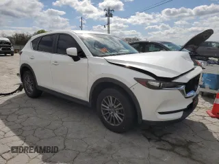 2017 Mazda CX-5 Sport with VIN JM3KFBBL8H0125972, listed as a Copart auction lot 52285975 with 123,853 mi miles and Salvage Title. Bid and sale history available at DreamBid. Image 4.