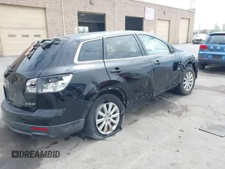 2010 Mazda CX-9 Grand Touring with VIN JM3TB2MV1A0203416, listed as a IAAI auction lot 42090500 with 131,659 mi miles and . Bid and sale history available at carsss.com. Image 4.