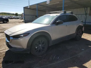 2022 Mazda CX-30 2.5 Turbo with VIN 3MVDMBAY9NM421742, listed as a Copart auction lot 67384674 with 74,987 mi miles and Salvage Title. Bid and sale history available at DreamBid. Image 1.